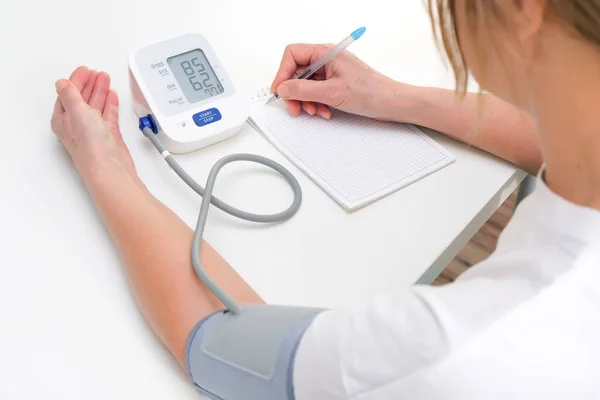 Adult Woman Measures Blood Pressure White Background Arterial Hypotension — Fotografia de Stock