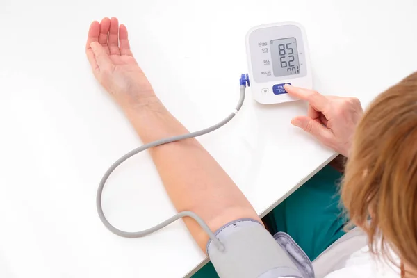 Adult Woman Measures Blood Pressure White Background Arterial Hypotension — Zdjęcie stockowe