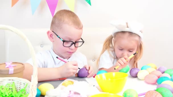 Funny Kids Bunny Ears Draws Eggs Easter Day Children Eat — Stock Video