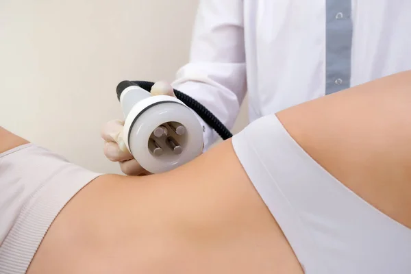 apparatus vacuum massage of the body against cellulite, burning and splitting fat. Skin care concept, smooth skin