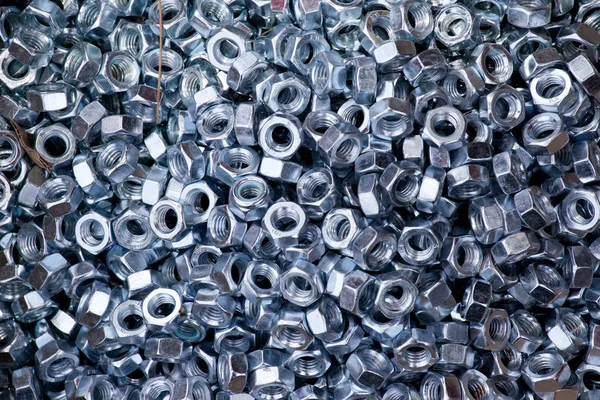 Pile of screw nuts — Stock fotografie