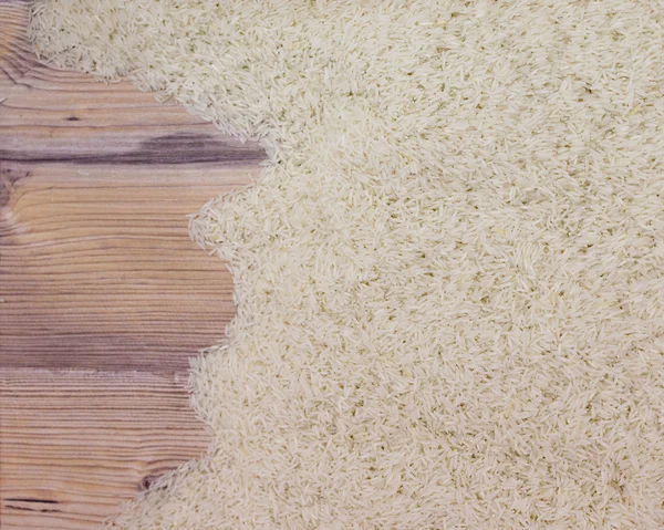 Ovansida av ris på träskiva — Stockfoto