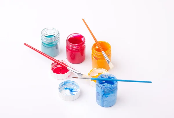 Tinta em frascos e escovas de vidro — Fotografia de Stock