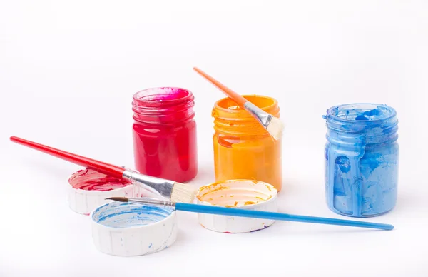 Paint in glass jars and brush — Φωτογραφία Αρχείου