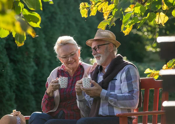 Romantic Senior Couple Sitting Banch Park Drinking Coffee Talking — Stock Photo, Image