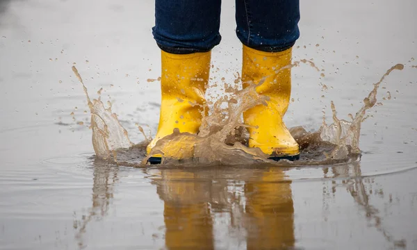Close Female Legs Yellow Gumboots Jumping Puddles Rain Field — Stock Photo, Image