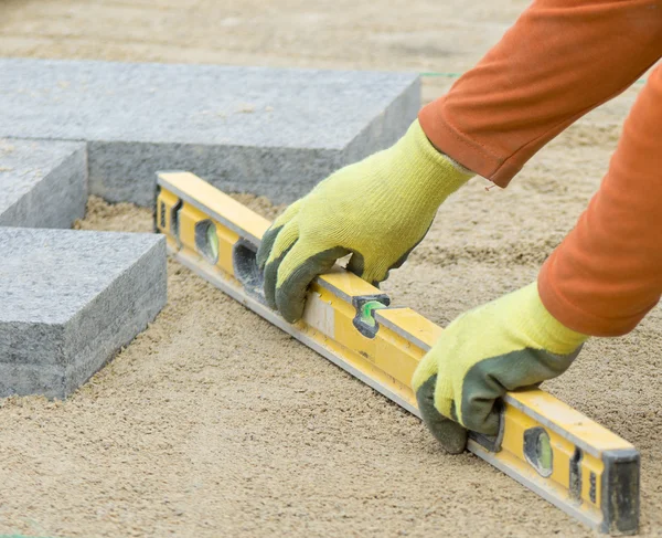 Bestratingsafwerkmachines herverdeling zand — Stockfoto