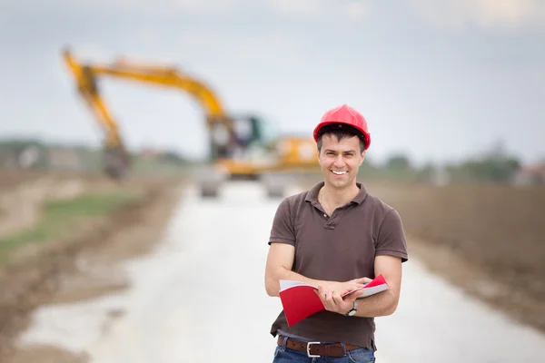 Ingenieur op weg bouwplaats — Stockfoto