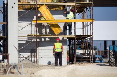 Workers on scaffolds clipart