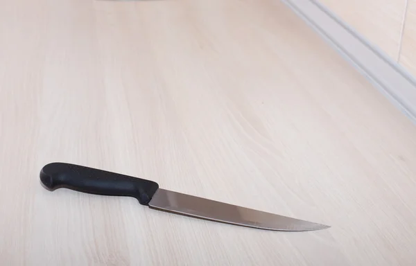 Knife on kitchen countertop — Stock Photo, Image