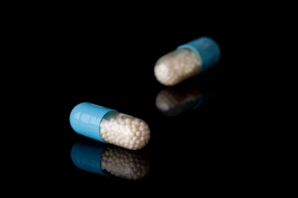 Blue capsules — Stock Photo, Image