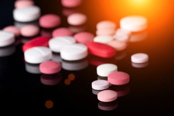 Coloridas pastillas en la pila —  Fotos de Stock