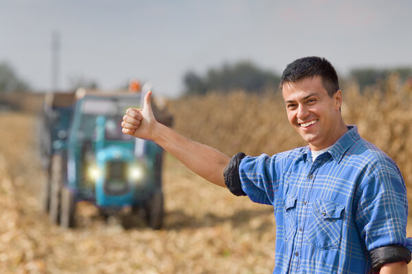 Satisfied farmer on farmland