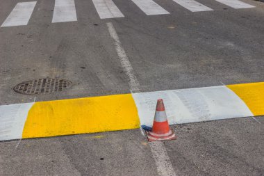 Freshly painted crosswalk and speed bump 2 clipart