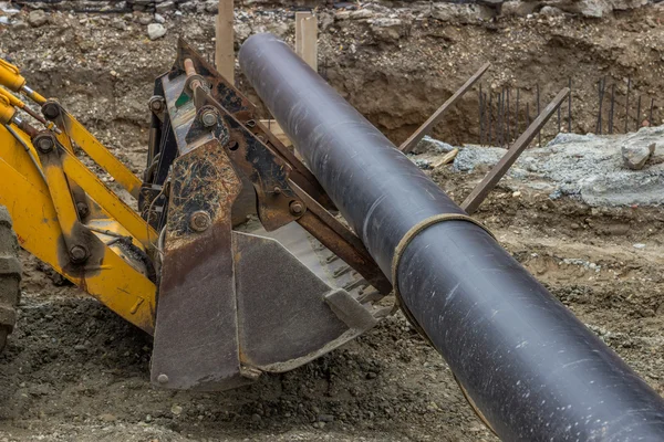 District heating pipe, ready for installation near trench — Stock Photo, Image