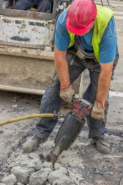 Gaten machine exploitant arbeider — Stockfoto