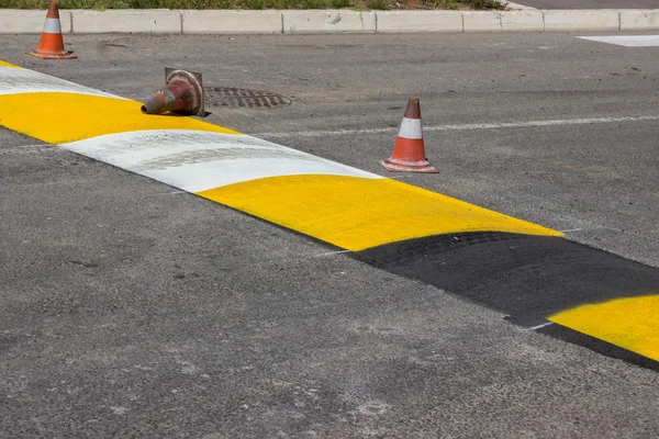 Just painted stripes on a speed bump — Stock Photo, Image
