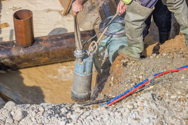Submersible water pump drain trench 2 — Stock Photo, Image