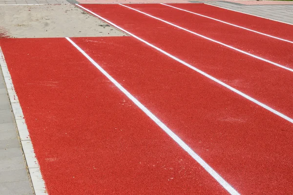 New track and long jump pit — Stock Photo, Image
