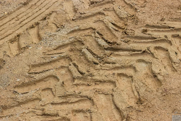 Tractor tyre track closeup on the muddy ground 2 — Stock Photo, Image