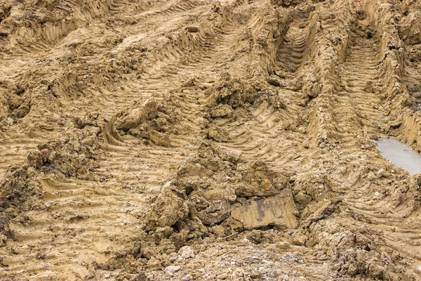 Truck tyre pattern on the frozen soil background — Stock Photo, Image