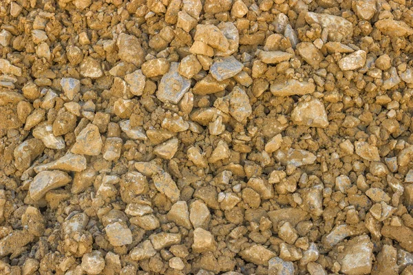 Yellow gravel for roads at construction site — Stock Photo, Image