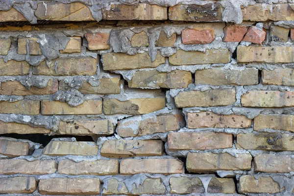 Broken brick wall background — Stock Photo, Image