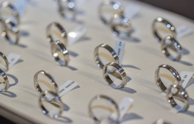 blurry and or out of focus wedding rings background clipart