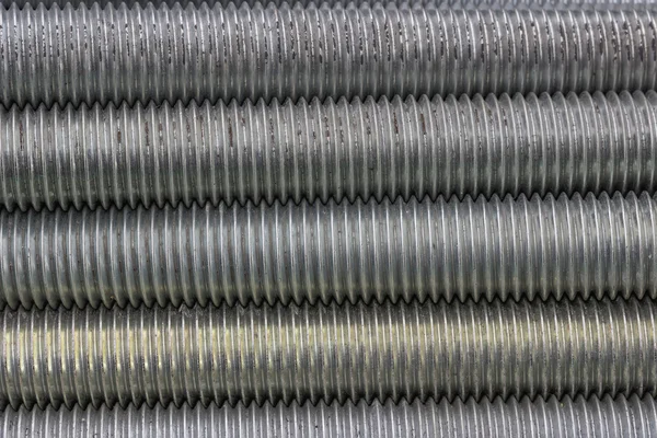 Long steel screws thread background 2 — Stock Photo, Image