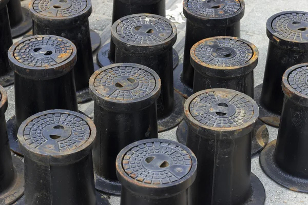 Circular cast iron water valve covers — Stock Photo, Image