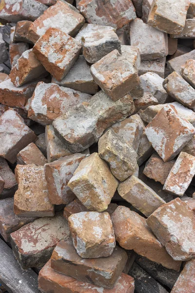 Pile of used red brick — Stock Photo, Image