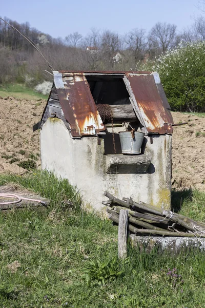 Old village well with pulley and bucket 2 — Stock Photo, Image