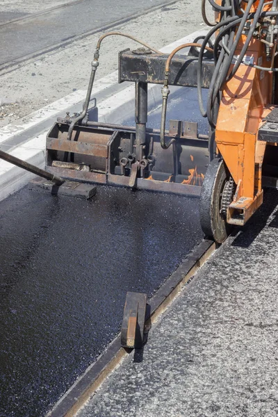 Installation of hard and cast molten asphalt — Stock Photo, Image
