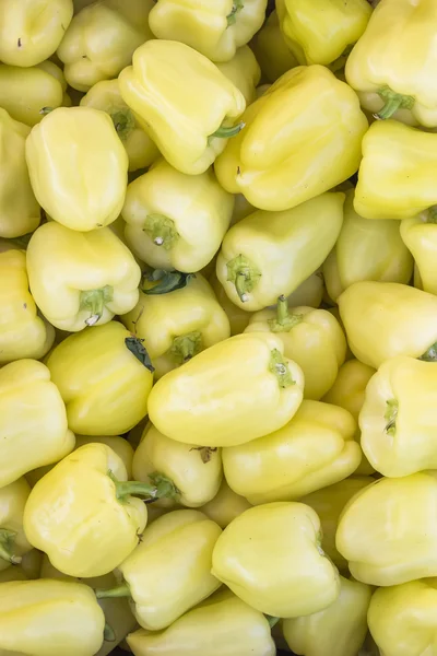 Background of yellow peppers — Stock Photo, Image