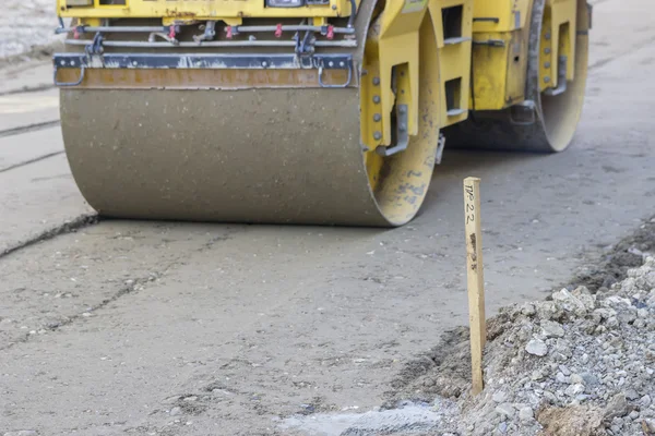 Survey stake marking the road — Stock Photo, Image