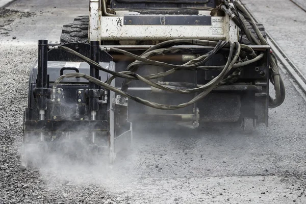 Moedor de asfalto para reparação pothole — Fotografia de Stock