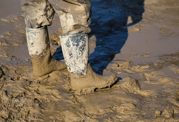 Bottes de travail boueuses — Photo