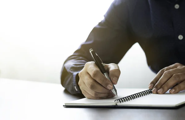 Businessman Hand Holding Writing Pen Memo Notebook Paper Table Desk — Stock Photo, Image