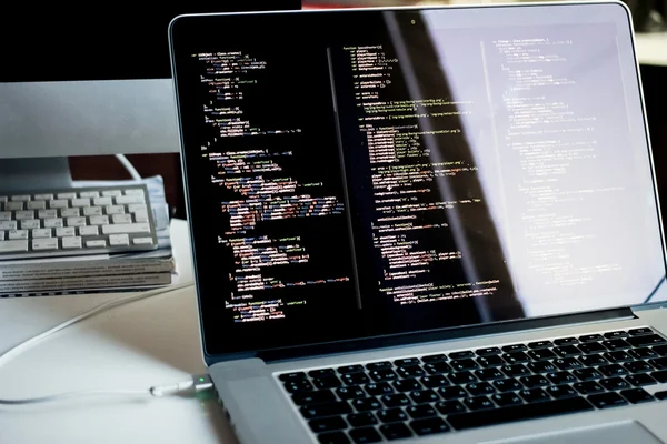 Js code on laptop screen, web development Stock Photo