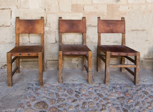 Három bőr és fa székek — Stock Fotó
