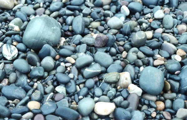 Abgerundete Steine Hintergrund — Stockfoto