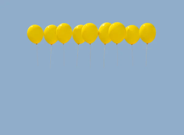 Девять жёлтых шариков — стоковое фото