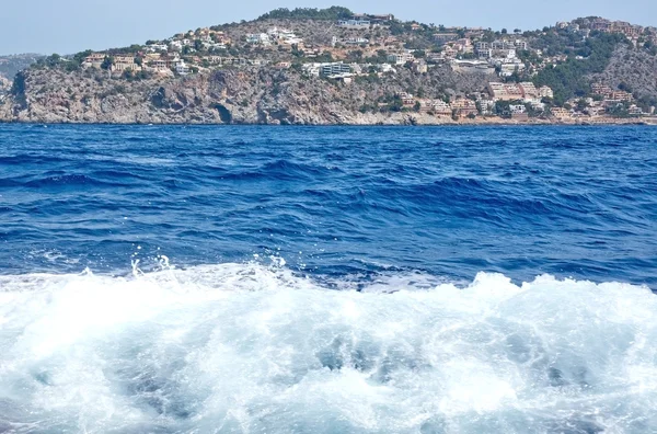 Ocean landscape with boat seafoam wake — Stock Photo, Image