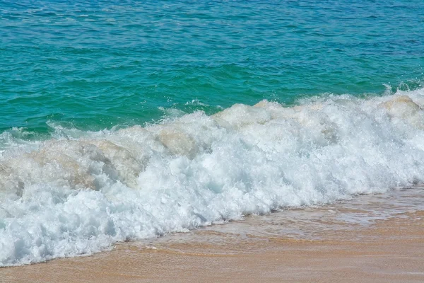 Grön våg whith vit seafoam närbild — Stockfoto