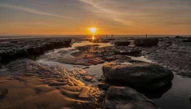 Kış günbatımı Plajı'nda