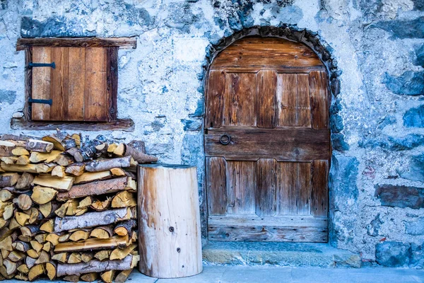 ancient wooden doors of the Tabia family in Fornesighe, in the Zoldo valley, Belluno Italy