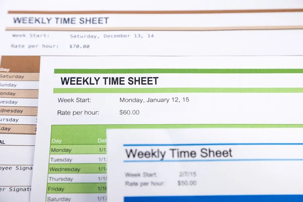 Formularios de hoja de tiempo semanal para nómina —  Fotos de Stock