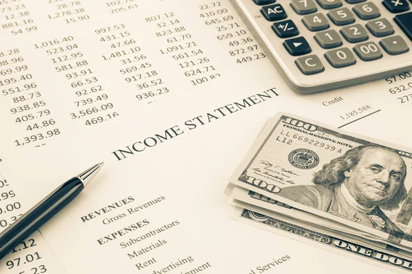 Money and income statement report in sepia tone — Stock Photo, Image