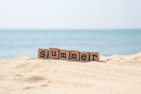 Summer holiday season at sea beach — Stock Photo, Image