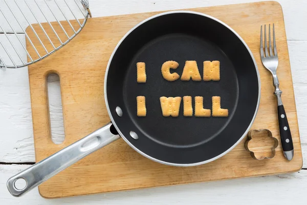 Letter cookies quote I CAN I WILL and kitchen utensils — Stock Photo, Image